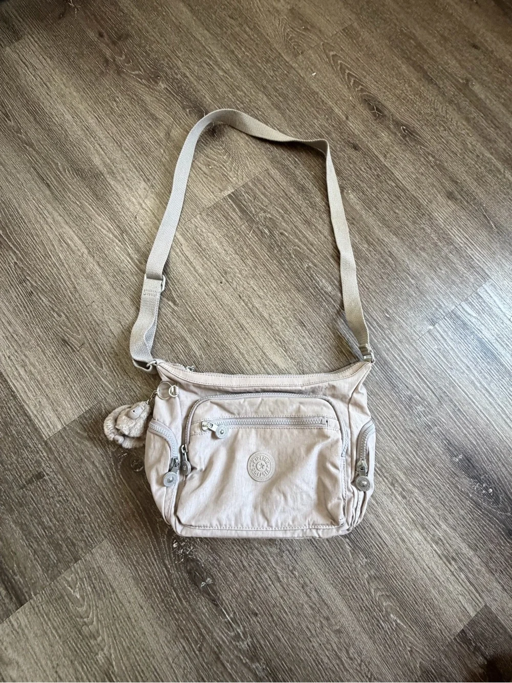 Kipling Light Beige Crossbody Bag with Multiple Zips